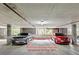 Designated parking spot featuring a car, providing convenient and secure parking for residents in a covered garage at 115 W Peachtree Nw Pl # 304, Atlanta, GA 30313