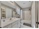 Bathroom featuring a shower over tub, ample storage and neutral colors at 1164 Britley Park Ln, Woodstock, GA 30189