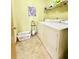 This laundry room has tile floors, standard size washer and dryer, shelving and storage for laundry needs at 1552 Longwood Dr, Lawrenceville, GA 30043