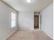 Comfortable bedroom with neutral carpet, window with blinds and neutral walls at 2045 Villa Spring Ct, Dacula, GA 30019