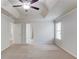 Spacious primary bedroom featuring neutral carpet and ceiling fan at 2045 Villa Spring Ct, Dacula, GA 30019