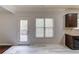 Bright eat-in kitchen with access to a deck and view of the backyard at 2045 Villa Spring Ct, Dacula, GA 30019