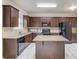 Spacious kitchen with stainless appliances, granite counters, and an island at 2045 Villa Spring Ct, Dacula, GA 30019