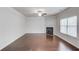 Spacious living room with hardwood floors and a fireplace at 2045 Villa Spring Ct, Dacula, GA 30019