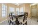 Eat-in dining area with large windows providing natural light and seating for six at 2470 Cordillo Dr, Dacula, GA 30019