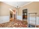 Open dining room featuring hardwood floors, chair rail, and access to kitchen and living room at 2470 Cordillo Dr, Dacula, GA 30019