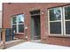 Brick back porch features large windows and a ramp at 4265 Almanor Cir, Norcross, GA 30071