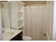Bathroom features a shower/tub combo and vanity for storage at 4265 Almanor Cir, Norcross, GA 30071