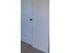 Neutral bedroom features a door and base trim at 4265 Almanor Cir, Norcross, GA 30071