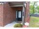 Close-up of a home's front door with visible house number and manicured landscaping at 4265 Almanor Cir, Norcross, GA 30071