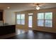 Open concept living and dining area with hardwood floors and lots of natural light at 4265 Almanor Cir, Norcross, GA 30071