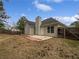 Backyard featuring a patio area and fenced perimeter at 100 Chartres St, Dallas, GA 30157