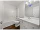 Bathroom with a shower and tub combo and a white vanity at 100 Chartres St, Dallas, GA 30157