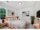 Cozy bedroom boasts a large window, neutral walls, and carpeted floors at 100 Chartres St, Dallas, GA 30157
