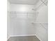 Walk-in closet with wire shelving for storage and organization at 100 Chartres St, Dallas, GA 30157