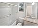 Bathroom with a shower-tub, vanity, window and standard toilet at 2021 Emerald Dr, Loganville, GA 30052