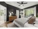 Bedroom with a ceiling fan, hard wood floors, and a window at 2400 Cumberland Se Pkwy # 804, Atlanta, GA 30339