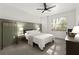 Serene bedroom showcasing a comfortable bed, stylish decor, and natural light from the window at 2400 Cumberland Se Pkwy # 804, Atlanta, GA 30339