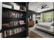 Bedroom featuring built in bookcase and a ceiling fan at 2400 Cumberland Se Pkwy # 804, Atlanta, GA 30339