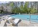 Enjoy this community pool with lounge chairs for relaxing on the sundeck at 2400 Cumberland Se Pkwy # 804, Atlanta, GA 30339