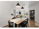 Elegant dining room open to the kitchen and living room, offering a seamless flow for entertaining and everyday living at 2400 Cumberland Se Pkwy # 804, Atlanta, GA 30339