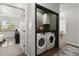 Convenient laundry area with a modern washer and dryer, plus extra storage at 2400 Cumberland Se Pkwy # 804, Atlanta, GA 30339
