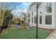 Private backyard with playset, lawn, large windows, and a swing set creates a Gathering-friendly retreat at 315 Stanyan Pl, Alpharetta, GA 30022