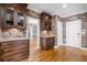 Well-appointed kitchen with custom cabinets and hardwood floors at 315 Stanyan Pl, Alpharetta, GA 30022