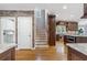 Spacious kitchen features a brick wall, custom cabinetry, stainless steel appliances and lots of room at 315 Stanyan Pl, Alpharetta, GA 30022