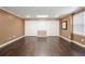 Bright living room features hardwood floors, recessed lighting, neutral paint, and double closets at 315 Stanyan Pl, Alpharetta, GA 30022