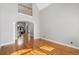 Open floor plan with hardwood floors, high ceilings, and ample natural light at 315 Stanyan Pl, Alpharetta, GA 30022