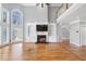 Spacious living room with a fireplace and large windows at 315 Stanyan Pl, Alpharetta, GA 30022