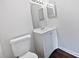 Bathroom with vanity, white cabinets and a large mirror at 4661 Cedar Park Trl, Stone Mountain, GA 30083