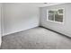 Bright bedroom with a neutral color palette and large window at 4661 Cedar Park Trl, Stone Mountain, GA 30083