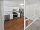 Modern kitchen with stainless steel appliances and hardwood floors at 4661 Cedar Park Trl, Stone Mountain, GA 30083