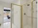 Bathroom featuring a glass enclosed shower and a view into the bedroom at 132 Westchester Se Dr, Smyrna, GA 30082