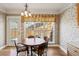 Cozy breakfast nook with natural light and views of the backyard at 132 Westchester Se Dr, Smyrna, GA 30082
