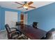 A conference room featuring a large table, seating, storage, and natural light at 132 Westchester Se Dr, Smyrna, GA 30082