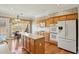 This beautiful kitchen features wood cabinets, an island, and stainless steel appliances at 132 Westchester Se Dr, Smyrna, GA 30082