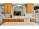 Bright kitchen featuring custom cabinets, tiled backsplash, and stainless-steel appliances at 132 Westchester Se Dr, Smyrna, GA 30082
