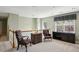 Inviting loft featuring plush carpet, seating, a chest, and a window at 132 Westchester Se Dr, Smyrna, GA 30082