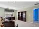 Bright office featuring plush carpet, a large window, and ample storage at 132 Westchester Se Dr, Smyrna, GA 30082