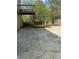 This backyard features a concrete patio and deck, offering a versatile outdoor living space at 4423 Roche St, Atlanta, GA 30349