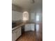 Bright kitchen featuring white cabinetry and modern appliances at 4423 Roche St, Atlanta, GA 30349