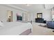 Spacious main bedroom with carpet, natural light, TV, and plenty of storage at 7200 Brigidoon Rose, Douglasville, GA 30134