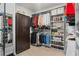 Organized walk-in closet with shelving, hanging rods, and ample storage space at 7200 Brigidoon Rose, Douglasville, GA 30134