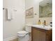 Powder room featuring wood vanity with tiled sink at 78 Beverly Ne Rd, Atlanta, GA 30309