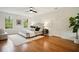 Spacious bedroom featuring hardwood flooring, a ceiling fan, and white trim at 78 Beverly Ne Rd, Atlanta, GA 30309
