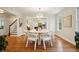 Bright dining room with hardwood floors, modern lighting, and views into other living spaces at 78 Beverly Ne Rd, Atlanta, GA 30309