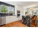 Stylish kitchen with stainless appliances, granite countertops, hardwood floors and breakfast bar at 78 Beverly Ne Rd, Atlanta, GA 30309